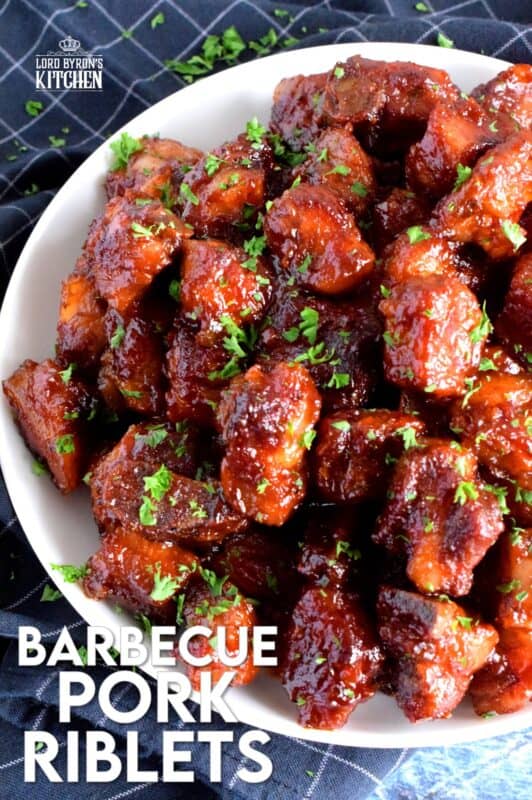 Perfectly baked, these fork-tender, fall-off-the-bone pork riblets, in a thick homemade barbecue sauce, couldn't get any easier! Do you remember when these used to be popular at buffet restaurants? This is a copycat version you can make at home! #pork #riblets #ribs #bbq #barbecue #oven #baked
