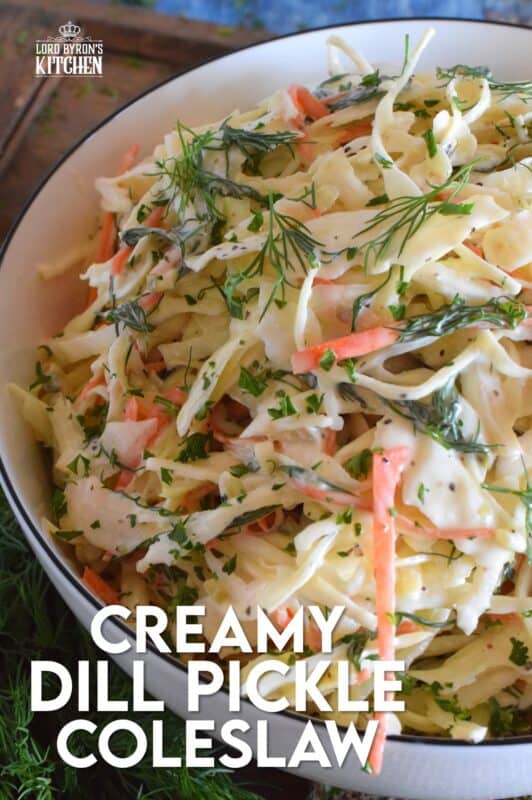 If you love dill, this Creamy Dill Pickle Coleslaw is for you! Slightly sweet and tangy, it is packed with lots of dill pickle flavour. In this recipe, there are three layers of dill flavour. There's lots of fresh dill, dill pickle juice, and finely chopped dill pickles. Is your mouth watering yet? #dillpickle #coleslaw #creamycoleslaw #pickles #salad