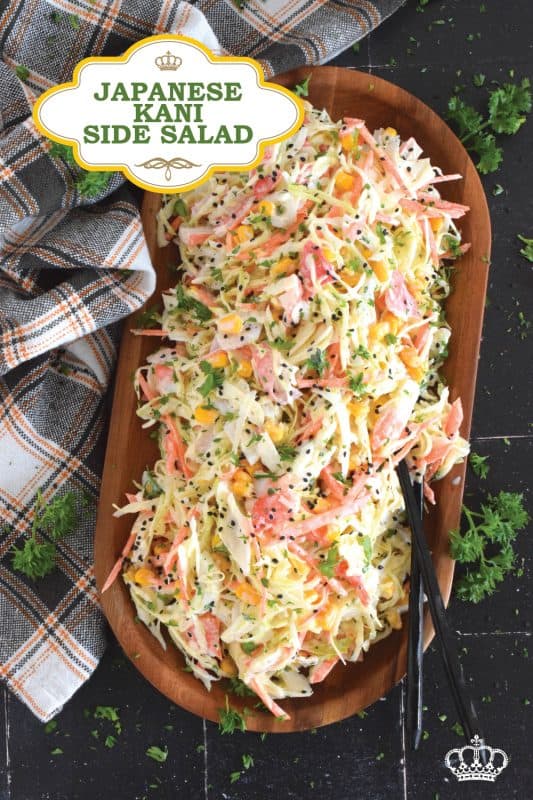 A popular side dish served with sushi, a Japanese Kani Side Salad is so delightfully refreshing, it should not be limited to just a sushi side!  Prepared with imitation crab, shredded cabbage, julienned carrots and corn in a creamy and zesty sauce, this salad is wonderfully easy and exceptionally delicious! #kani #salad #japanese #crab