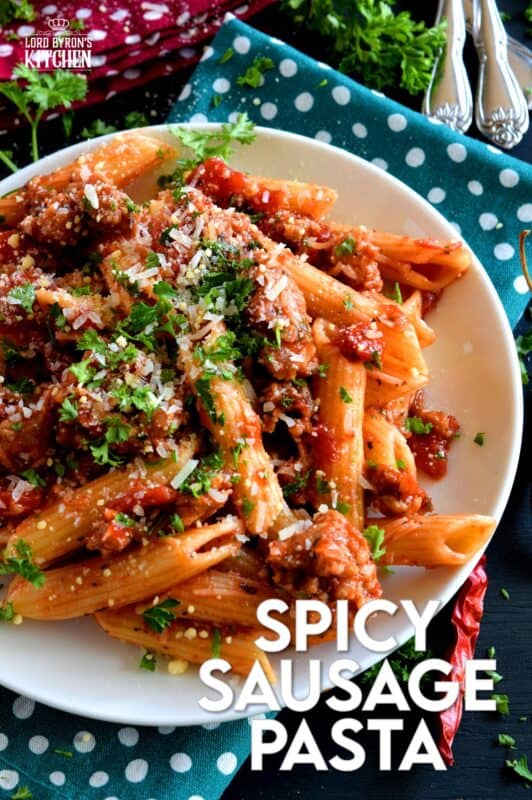 Prepare your next pasta dish with pork, like this Spicy Sausage Pasta dish, and reinvent pasta night!  A spicy tomato sauce, with peppers and onions, and lots of dried chillies, is simple and rustic, but so delicious! This hearty meal is make-ahead and freezer friendly too! #penne #pasta #italian #sausage #spicy
