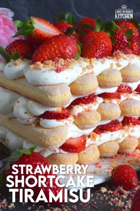 Locally grown strawberries are about to be in season which means it is time for a little indulgence!  Strawberry Shortcake Tiramisu is the most delicious summertime dessert.  With layers of homemade strawberry shortcake crumbs, light and airy ladyfingers, and a thick, slightly sweet filling, this dessert is completely irresistible! #strawberry #shortcake #tiramisu