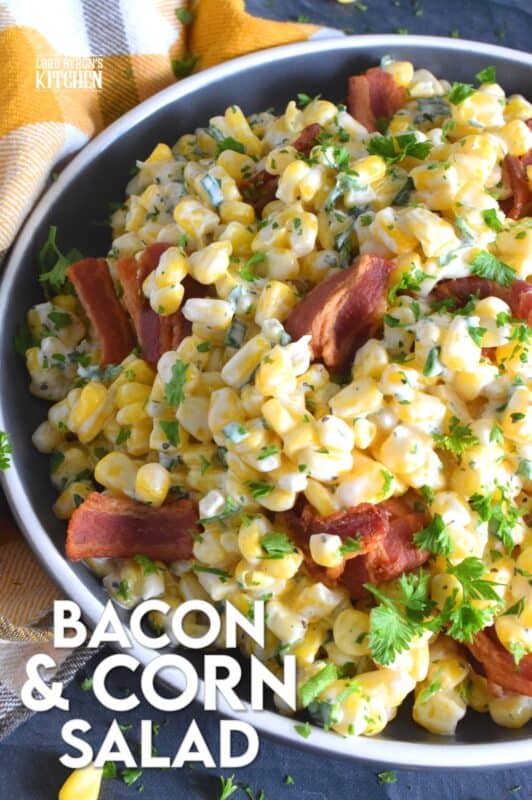 Serve this Bacon and Corn Salad warm as a side to your favourite summer grilled mains.  Loaded with fried bacon, bright yellow corn, and fresh green onions, this salad is tossed with a kicked-up mayonnaise-based dressing.  Can be prepared ahead of time too and just lightly reheated through just before serving! #bacon #corn #salad