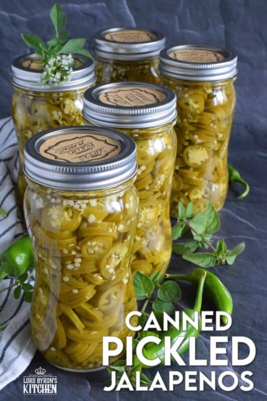 Pair these Canned Pickled Jalapenos with sandwiches, pizza, nachos, burgers, and even scrambled eggs!  All you need to prepare these are jalapenos, white vinegar, salt, and water!  Easily double or even triple the recipe and stock your canning pantry with these delicious hot and spicy morsels! #pickled #jalapenos