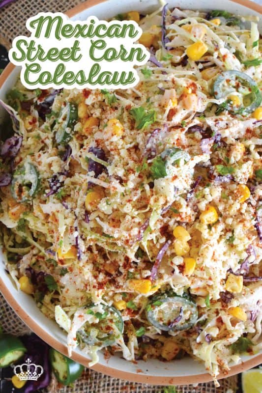 Crisp red and green cabbage, sweet corn, spicy jalapenos, fresh green onions, and salty cotija cheese all meet in the middle to create this most delicious Mexican Street Corn Coleslaw. With its creamy, zingy, and tart dressing, this coleslaw will most definitely please the toughest critic! #mexican #streetcorn #coleslaw #salad
