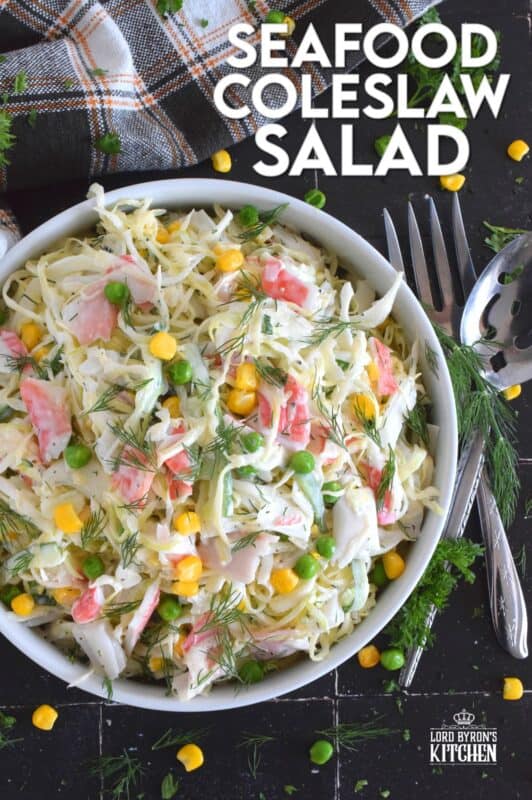 Chunks of crab and lobster are tossed with lots of fresh vegetables, like cabbage, cucumber, corn, peas, and green onions in a homemade creamy, tangy, and savoury dressing. Consider your budget and use real seafood or imitation crab and lobster to make this absolutely refreshing Seafood Coleslaw Salad! #seafood #salad #coleslaw #imitation #crab #lobster