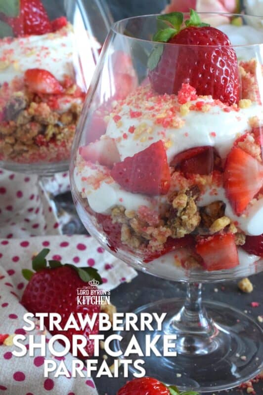 This beautifully presented dessert is exceptionally easy to prepare.  Layered with granola, yogurt, and fresh strawberries, is a homemade strawberry shortcake crumb mixture that is the star of this simply refreshing summertime dessert.  It's a healthy alternative with just the right amount of indulgence! #strawberries #shortcake #parfait #crumbs