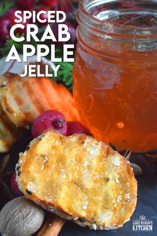 Easily transform those overly tart backyard crab apples into the most delicious Spiced Crab Apple Jelly! All you need are crab apples, water, sugar, and a few spices! This jelly is sweet and tart and has a strong crab apple flavour.  With the addition of cinnamon, nutmeg, allspice, and ginger, the taste is warming and comforting too. #crabapple #apple #jelly