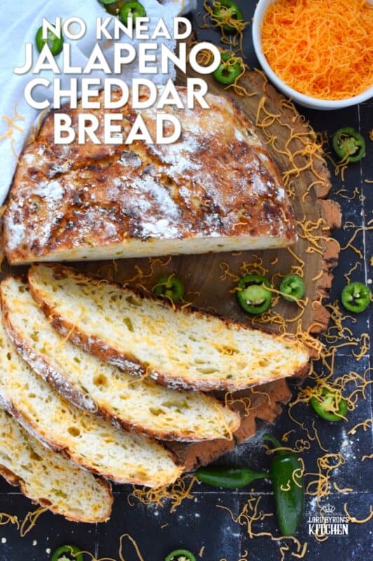 There’s something really soothing and satisfying about freshly baked bread. Even more so when you bake that bread yourself! No Knead Jalapeno Cheddar Bread is one of the most delicious and easiest breads you'll ever make!  Loaded with freshly chopped jalapenos and grated cheese, this bread is cheesy and moderately spicy - perfect to dip into soup! #bread #dutchoven #jalapeno #cheddar #artisan #homemade