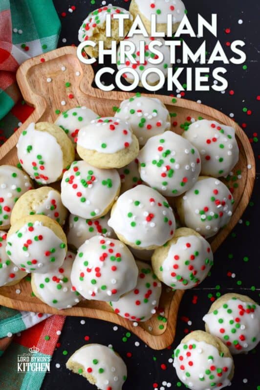 Italian Christmas Cookies just might be one of the most sought-after holiday cookies ever - right after shortbread!  These soft, moist, and sweet cookies are prepared with salted butter and ricotta cheese.  You just know that if those two ingredients are in anything, it's going to be delicious! Topped with icing and sprinkles, these just scream Christmas! #italian #cookies #ricotta