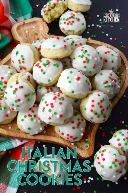 Italian Christmas Cookies just might be one of the most sought-after holiday cookies ever - right after shortbread!  These soft, moist, and sweet cookies are prepared with salted butter and ricotta cheese.  You just know that if those two ingredients are in anything, it's going to be delicious! Topped with icing and sprinkles, these just scream Christmas! #italian #cookies #ricotta