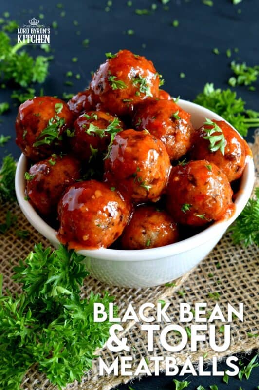 Black Bean and Tofu Meatballs are moist, flavourful, and vegetarian!  Seasoned with familiar herbs and spices, and tossed in the sauce of your choice, these meatballs aim to please, and they do just that! Serve these as an appetizer, with your favourite pasta, or as I like to do, with piping hot mashed potatoes! #meatballs #blackbean #tofu #vegetarian