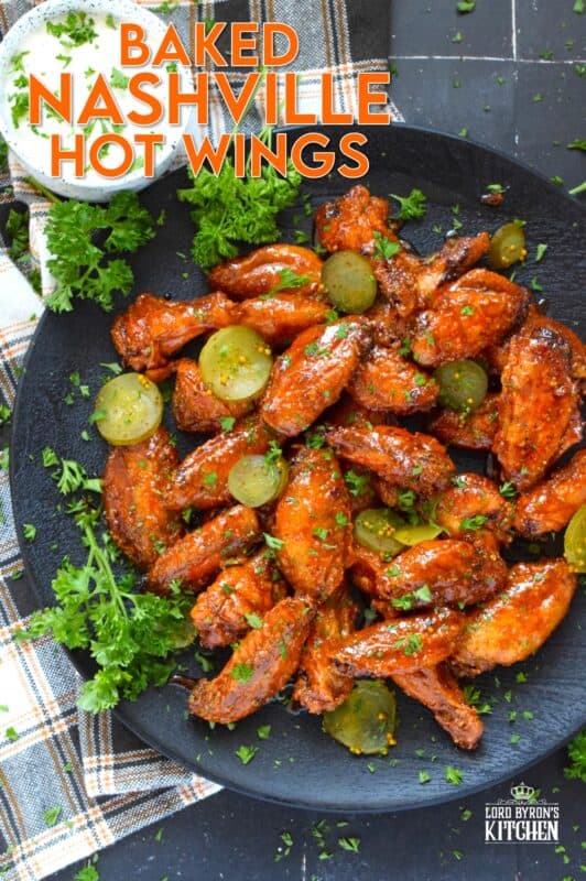 Baked to perfection with a crispy coating and a tender and juicy interior, these wings are drenched in a hot sauce comprised of cayenne, chili, garlic, onion, and melted butter, Baked Nashville Hot Wings also have an optionally sweet honey component!  Plate these wings with sweet pickle slices for a cooling crunch! #baked #nashville #hot #chicken #wings #sticky