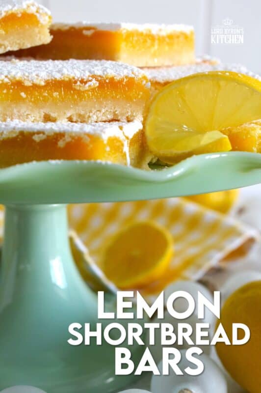 Pucker up!  These Lemon Shortbread Bars are perfectly balanced with tartness from the lemons and sweetness from the sugar.  The easy to prepare lemon filling is baked right on top of that homemade buttery shortbread crust.  Perfect to serve at Easter brunch, a light and refreshing summer dessert, but so delicious you can whip up a batch of these for any occasion! #lemon #bars #shortbread #easter #squares