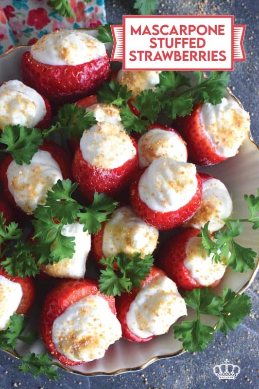 Mascarpone is blended with cream, sugar, and vanilla to make the most delicious dessert topping. In this recipe, the mixture is stuffed into hulled fresh strawberries and topped with a sprinkling of graham cracker crumbs for texture and flavour. This simple and easy dessert is big on taste! #mascarpone #stuffed #strawberries #nobake #dessert