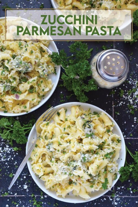 Perfectly cooked pasta is tossed with shredded zucchini that has been sauteed in butter with garlic, shallots, and chilies.  Topped with loads of fresh parmesan and your choice of herbs, Zucchini Parmesan Pasta is a quick and easy meal perfect for a family dinner or a meal for one while sitting on the couch with a movie! #zucchini #parmesan #pasta #vegetarian