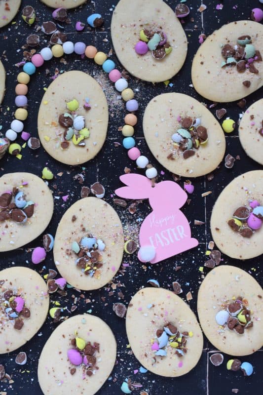 Easter Shortbread Cookies are prepared with a light and airy shortbread cookie base consisting of only three ingredients! The fourth and final ingredient is everyone's favourite Easter treat, crushed Cadbury Mini Eggs! These are so simple, so fast, and so easy to make! #minieggs #cadbury #easter #shortbread #cookies