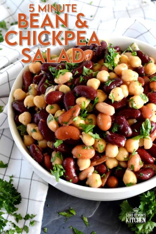 A quick, delicious, and hearty salad that's perfect for any occasion! This 5 Minute Bean and Chickpea Salad will pair well with anything you serve at a picnic, backyard barbecue, or local church potluck! A tangy and savoury salad this good and this inexpensive is a keeper for sure! #chickpea #bean #salad #side #vegetarian #nobake #canned #5minuterecipes