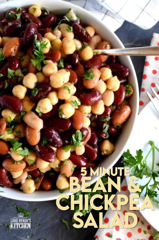 A quick, delicious, and hearty salad that's perfect for any occasion! This 5 Minute Bean and Chickpea Salad will pair well with anything you serve at a picnic, backyard barbecue, or local church potluck! A tangy and savoury salad this good and this inexpensive is a keeper for sure! #chickpea #bean #salad #side #vegetarian #nobake #canned #5minuterecipes