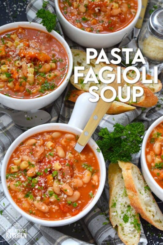 One of the most warming and cozy soups, Pasta Fagioli Soup is prepared with canned cannellini beans, canned tomato sauce, store-bought vegetable stock, dried herbs and seasonings, and a box of pasta.  Needless to say, most of the ingredients just might be in your pantry already!  About 30 minutes from start to finish is all you need! #soup #pasta #fagioli #vegetarian #beans