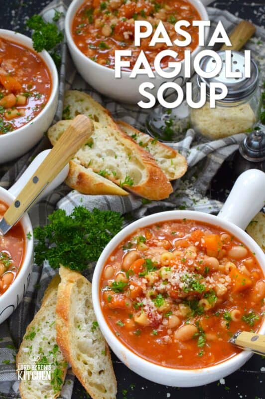 One of the most warming and cozy soups, Pasta Fagioli Soup is prepared with canned cannellini beans, canned tomato sauce, store-bought vegetable stock, dried herbs and seasonings, and a box of pasta.  Needless to say, most of the ingredients just might be in your pantry already!  About 30 minutes from start to finish is all you need! #soup #pasta #fagioli #vegetarian #beans