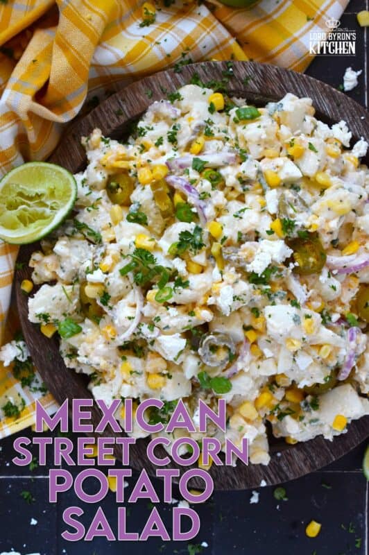Chopped potatoes are tossed with sweet corn, spicy jalapenos, boiled eggs, fresh green and red onions, and salty cotija cheese to create this most delicious Mexican Street Corn Potato Salad! With its creamy, zingy, and tart dressing, this potato salad will most definitely be the most popular side at any backyard barbecue this summer! #salad #potato #streetcorn #mexican #cotija