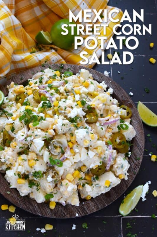 Chopped potatoes are tossed with sweet corn, spicy jalapenos, boiled eggs, fresh green and red onions, and salty cotija cheese to create this most delicious Mexican Street Corn Potato Salad! With its creamy, zingy, and tart dressing, this potato salad will most definitely be the most popular side at any backyard barbecue this summer! #salad #potato #streetcorn #mexican #cotija