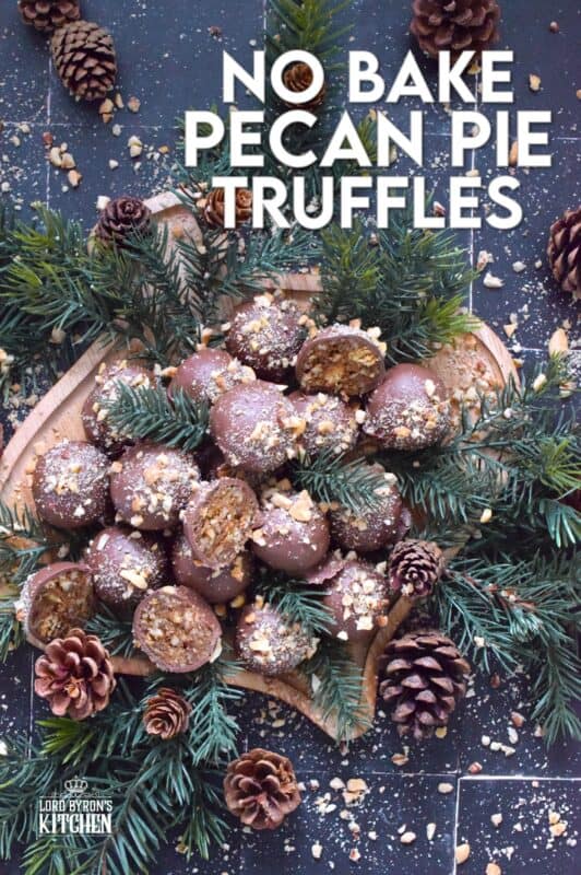 Phenomenal is the only word to describe these No Bake Pecan Pie Truffles! In just a few minutes, the filling is easily prepared and can be made in advance.  Roll the filling into balls and dip them into silky smooth melted milk chocolate.  Top these truffles with more chopped pecans and enjoy! #pecan #balls #truffles #holiday #chocolate #nobake