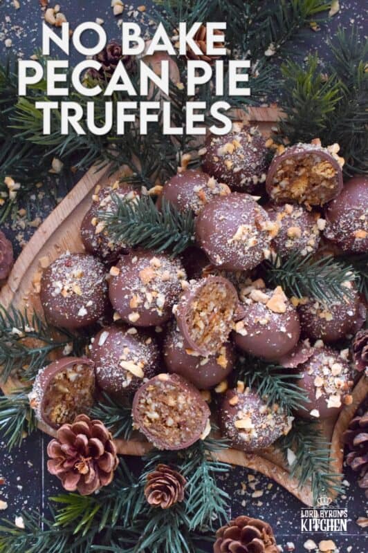 Phenomenal is the only word to describe these No Bake Pecan Pie Truffles! In just a few minutes, the filling is easily prepared and can be made in advance.  Roll the filling into balls and dip them into silky smooth melted milk chocolate.  Top these truffles with more chopped pecans and enjoy! #pecan #balls #truffles #holiday #chocolate #nobake