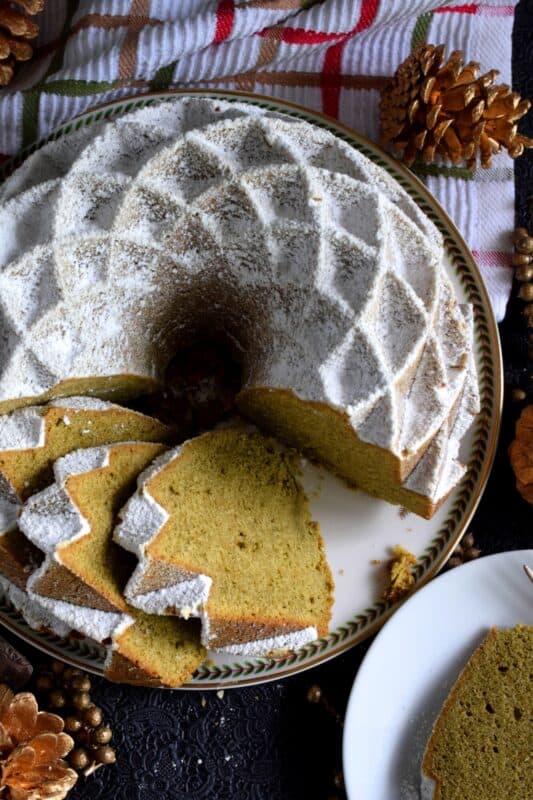 This bundt is green for the holidays! If you've never baked a cake with matcha, you must do it immediately!  The earthly, slightly bitter taste of matcha is balanced with the addition of sugar and vanilla.  This cake is one of my personal favourites! #matcha #bundt #holiday #cake