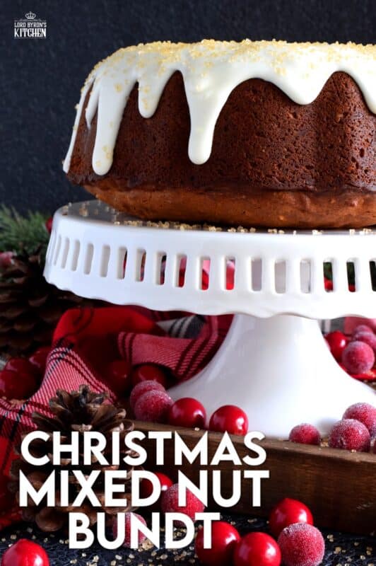 Mixed nuts were always a popular snack item at Christmastime in our home, which is why this Christmas Mixed Nut Bundt Cake is nostalgic and delicious! This cake is made with cream cheese in the batter, so you know it's going to be super moist! The ground spices add so much warmth and aroma! #mixednuts #bundt #cake