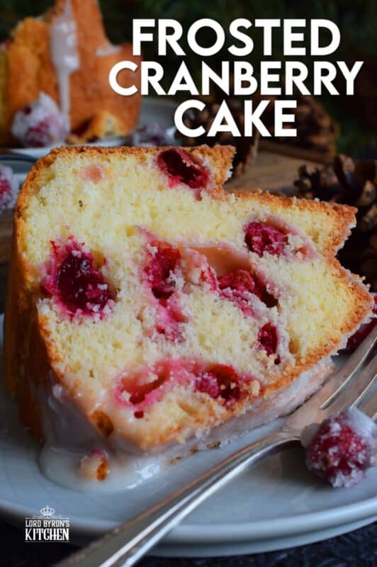 This super easy and beautiful Frosted Cranberry Bundt Cake is loaded with whole, fresh cranberries, frosted with a simple icing, and topped with a sugared cranberry garnish. Tart, sweet, and perfect for any holiday table, this gorgeous, showstopping cake is even more delicious than it looks! #cranberry #bundt #cake #frosted
