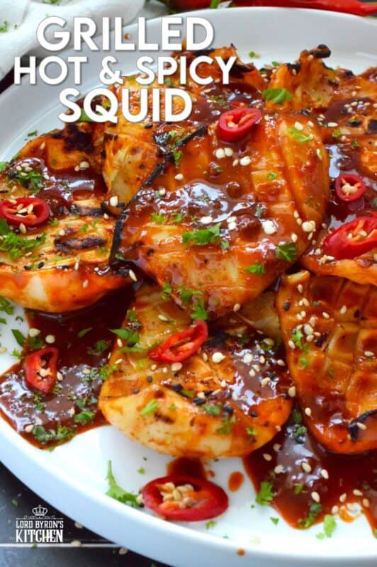 Any excuse to grill is a good excuse! This recipe makes use of a homemade sauce consisting of garlic, ginger, soy sauce, red chilies, and hot sauce. Grilled Hot and Spicy Squid is quick and easy; the squid is super tender with a few char marks. Use freshly prepared squid or frozen squid tubes here! #squid #grilled #hot #spicy #calamari #tubes