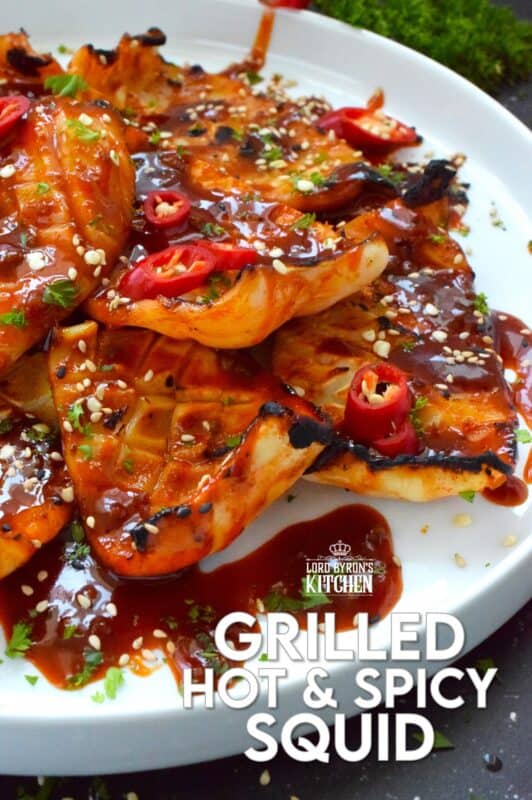 Any excuse to grill is a good excuse! This recipe makes use of a homemade sauce consisting of garlic, ginger, soy sauce, red chilies, and hot sauce. Grilled Hot and Spicy Squid is quick and easy; the squid is super tender with a few char marks. Use freshly prepared squid or frozen squid tubes here! #squid #grilled #hot #spicy #calamari #tubes