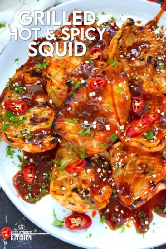 Any excuse to grill is a good excuse! This recipe makes use of a homemade sauce consisting of garlic, ginger, soy sauce, red chilies, and hot sauce. Grilled Hot and Spicy Squid is quick and easy; the squid is super tender with a few char marks. Use freshly prepared squid or frozen squid tubes here! #squid #grilled #hot #spicy #calamari #tubes