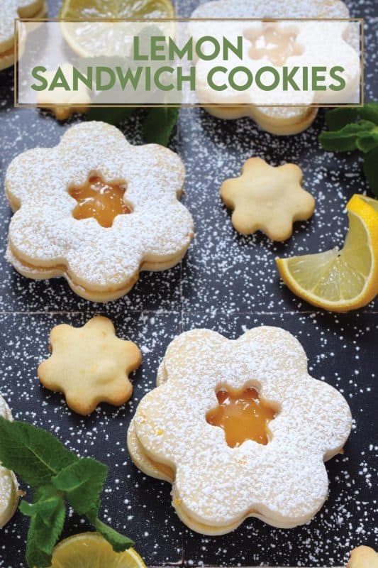 This recipe starts with an easy to prepare shortbread cookie that is generously infused with freshly grated lemon zest.  Once baked and cooled, two cookies are sandwiched with lemon curd; these Lemon Sandwich Cookies are super refreshing and make a perfect summertime treat or springtime brunch dessert! #lemon #curd #zest #sandwich #cookies