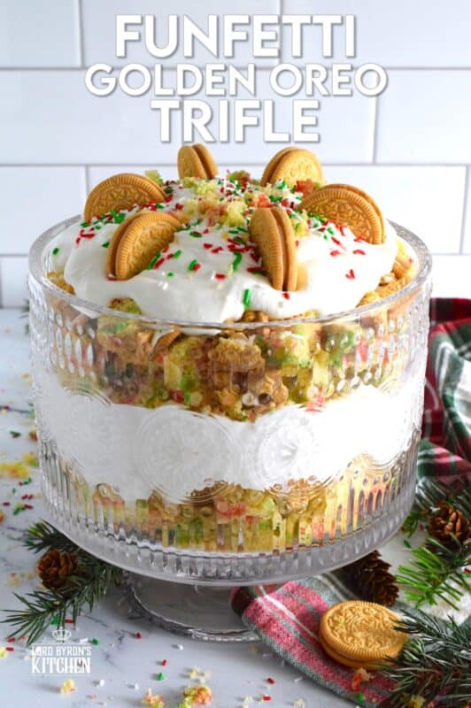 Starting with a homemade vanilla funfetti cake, this Funfetti Golden Oreo Trifle is layered with light and fluffy whipped cream, festive sprinkles, and crushed Oreo cookies. Put a smile on everyone's face with this deliciously gorgeous and easy Christmas dessert! #trifle #oreo #funfetti #sprinkles