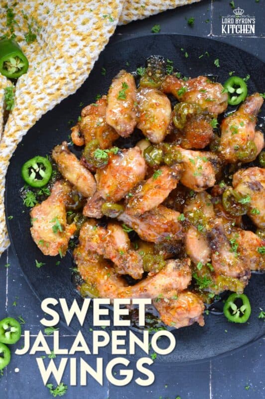 The wings are first baked to perfection with a crispy coating and a tender and juicy interior before being tossed in a thick, sweet, spicy, and sticky sauce. Sweet Jalapeno Wings are drenched in sauce, so be sure to have napkins close by! The combination of jalapenos with brown sugar, vinegar, and seasonings is simply wonderful! #chicken #wings #jalapeno #sticky #sweet #sauce