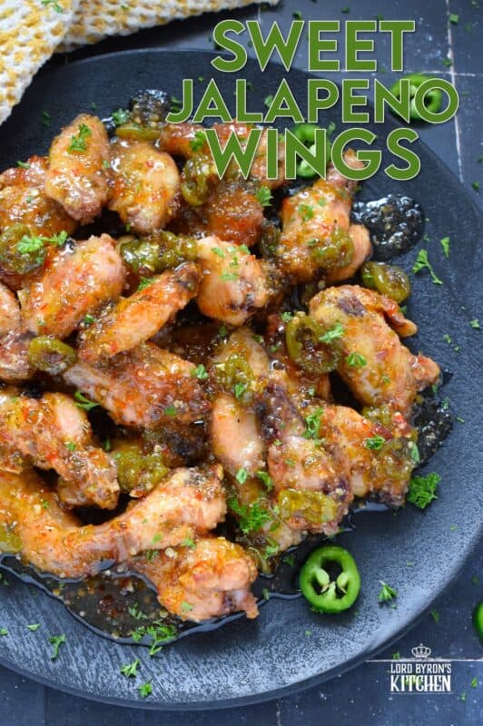 The wings are first baked to perfection with a crispy coating and a tender and juicy interior before being tossed in a thick, sweet, spicy, and sticky sauce. Sweet Jalapeno Wings are drenched in sauce, so be sure to have napkins close by! The combination of jalapenos with brown sugar, vinegar, and seasonings is simply wonderful! #chicken #wings #jalapeno #sticky #sweet #sauce