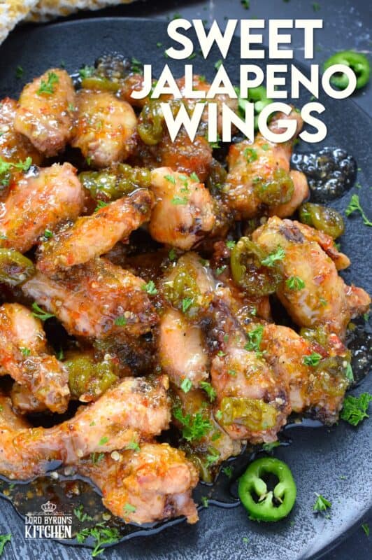 The wings are first baked to perfection with a crispy coating and a tender and juicy interior before being tossed in a thick, sweet, spicy, and sticky sauce. Sweet Jalapeno Wings are drenched in sauce, so be sure to have napkins close by! The combination of jalapenos with brown sugar, vinegar, and seasonings is simply wonderful! #chicken #wings #jalapeno #sticky #sweet #sauce