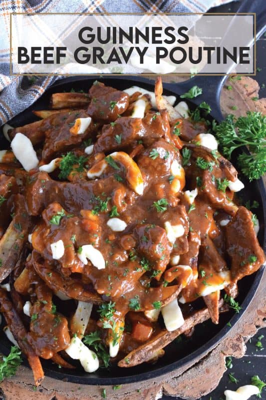 Crispy, homemade fries, top with squeaky cheese curds, and smothered in a delicious beef gravy made with guinness beer, this Irish-inspired poutine adds a St. Patrick's Day twist to a popular Canadian dish that everyone loves to dig into! #stpatricksday #irish #poutine #beef #beer #guinness #stout #gravy
