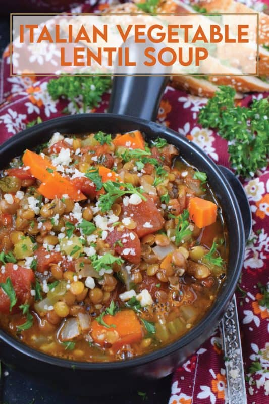Italian Vegetable Lentil Soup is in fact more like a stew than a soup! It has a homestyle tomato flavour combined with the heartiness of tender, cooked lentils, and is paired with lots of fresh and good-for-you vegetables too. Top with grated parmesan and serve with crusty bread! #lentils #vegetable #soup #italian #parmesan