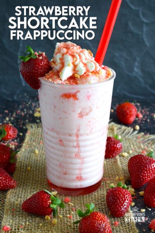 A frappuccino from Starbucks is one of my guilty pleasures, however, the rising cost of such pleasures has me learning how to make them at home for a fraction of the cost. This Strawberry Shortcake Frappuccino is prepared with homemade strawberry shortcake crumbs, milk, ice, vanilla extract, strawberry syrup, and whipped cream. It's even more delicious than it looks! #strawberry #shortcake #frappuccino #summer #frosty