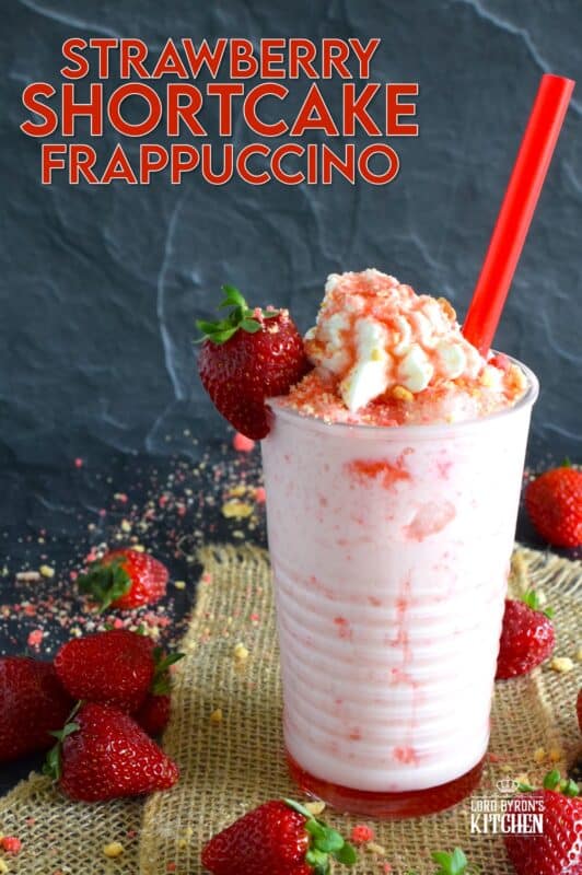 A frappuccino from Starbucks is one of my guilty pleasures, however, the rising cost of such pleasures has me learning how to make them at home for a fraction of the cost. This Strawberry Shortcake Frappuccino is prepared with homemade strawberry shortcake crumbs, milk, ice, vanilla extract, strawberry syrup, and whipped cream. It's even more delicious than it looks! #strawberry #shortcake #frappuccino #summer #frosty