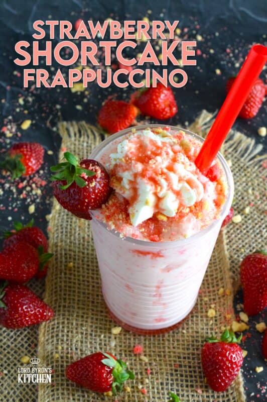 A frappuccino from Starbucks is one of my guilty pleasures, however, the rising cost of such pleasures has me learning how to make them at home for a fraction of the cost. This Strawberry Shortcake Frappuccino is prepared with homemade strawberry shortcake crumbs, milk, ice, vanilla extract, strawberry syrup, and whipped cream. It's even more delicious than it looks! #strawberry #shortcake #frappuccino #summer #frosty