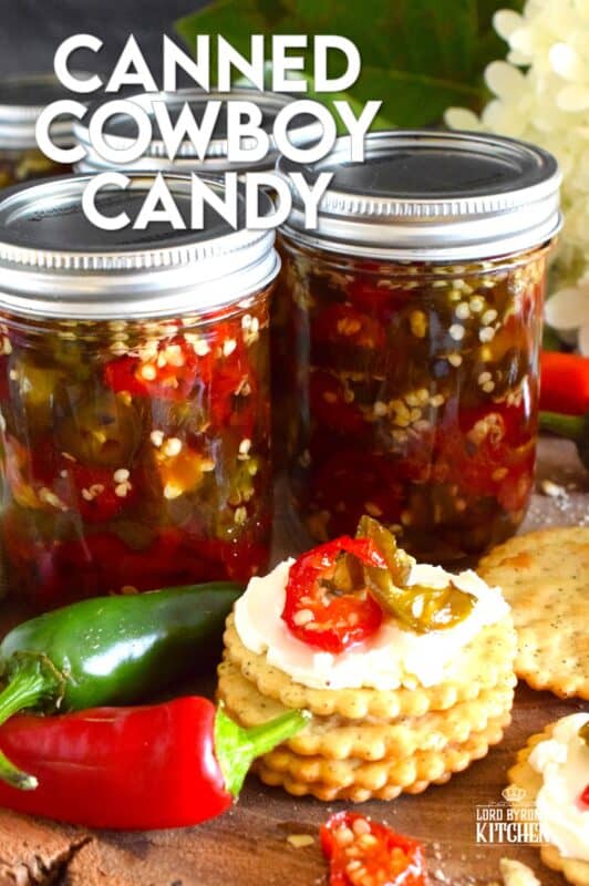 There are several types of canned jalapeno recipes that use up my summer jalapeno harvest, but Canned Cowboy Candy is my favourite! The jalapenos are boiled in a thick syrupy brine to draw out much of the moisture which results in a slighty chewy, sweet and spicy, delicously addicting candy-like treat that tastes great on just about everything! #canned #preserved #jalapeno #jalapenos #cowboy #candy
