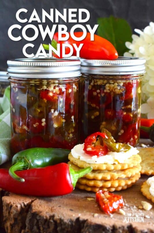 There are several types of canned jalapeno recipes that use up my summer jalapeno harvest, but Canned Cowboy Candy is my favourite! The jalapenos are boiled in a thick syrupy brine to draw out much of the moisture which results in a slighty chewy, sweet and spicy, delicously addicting candy-like treat that tastes great on just about everything! #canned #preserved #jalapeno #jalapenos #cowboy #candy