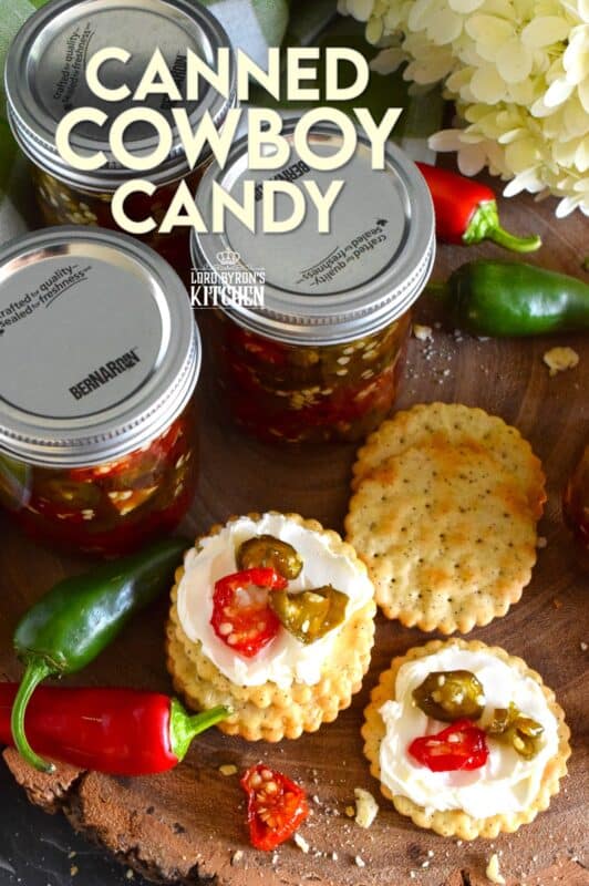 There are several types of canned jalapeno recipes that use up my summer jalapeno harvest, but Canned Cowboy Candy is my favourite! The jalapenos are boiled in a thick syrupy brine to draw out much of the moisture which results in a slighty chewy, sweet and spicy, delicously addicting candy-like treat that tastes great on just about everything! #canned #preserved #jalapeno #jalapenos #cowboy #candy