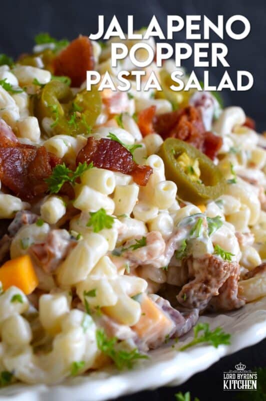 It cannot be called a Jalapeno Popper Pasta Salad if it isn't loaded with jalapenos, bacon, and cheese! To make this salad even better, add a good splash of pickled jalapeno juice to the dressing! Make this salad ahead of time and store it in your fridge until ready to serve! #jalapeno #popper #salad #pastasalad #pasta #bbq