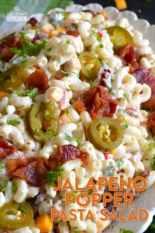 It cannot be called a Jalapeno Popper Pasta Salad if it isn't loaded with jalapenos, bacon, and cheese! To make this salad even better, add a good splash of pickled jalapeno juice to the dressing! Make this salad ahead of time and store it in your fridge until ready to serve! #jalapeno #popper #salad #pastasalad #pasta #bbq