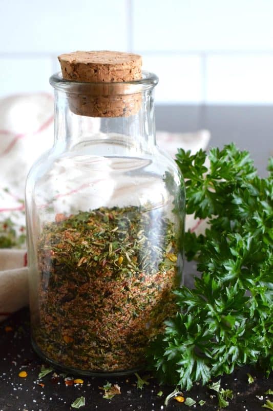 Chicken never has to be boring or bland again! This quick and easy homemade Chicken Seasoning Blend will add so much flavour to baked, pan-fried, or air-fryer chicken.  Sprinkle on as little or as much as you want and enjoy!  Make a batch of this seasoning with common herbs and spices found in your spice rack! #chicken #seasoning #blend #homemade